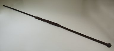  <em>Cane</em>. Light wood, 55 7/8 x 1 9/16 in. (142 x 4 cm). Brooklyn Museum, Museum Expedition 1922, Robert B. Woodward Memorial Fund, 22.953. Creative Commons-BY (Photo: Brooklyn Museum, CUR.22.953_threequarter_PS5.jpg)