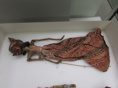  <em>Puppet</em>. Wood, pigment, cloth, fiber, 8 11/16 × 27 9/16 in. (22 × 70 cm). Brooklyn Museum, 23.241-. Creative Commons-BY (Photo: , CUR.23.241[DUP]_overall.jpg)