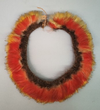 Tukano. <em>Wreath</em>, early 20th century. Red and yellow feathers, 8 1/2 × 8 1/8 × 1 3/4 in. (21.6 × 20.6 × 4.4 cm). Brooklyn Museum, Gift of Caspar Whitney, 23.282.11. Creative Commons-BY (Photo: Brooklyn Museum, CUR.23.282.11.jpg)