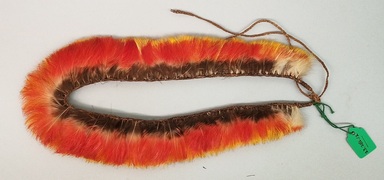Tukano. <em>Wreath</em>, early 20th century. Feathers, plant fiber, 4 1/4 × 1/2 × 10 1/4 in. (10.8 × 1.3 × 26 cm). Brooklyn Museum, Gift of Caspar Whitney, 23.282.12. Creative Commons-BY (Photo: Brooklyn Museum, CUR.23.282.12.jpg)