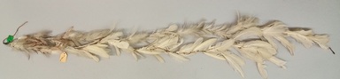 Tukano. <em>Chain</em>, early 20th century. Feathers, plant fiber, 9 5/8 × 3 × 48 1/4 in. (24.4 × 7.6 × 122.6 cm). Brooklyn Museum, Gift of Caspar Whitney, 23.282.15. Creative Commons-BY (Photo: Brooklyn Museum, CUR.23.282.15_view01.jpg)