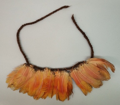 Tukano. <em>Anklet or Wrist Ornament</em>, early 20th century. Feathers, plant fiber, cotton?, seed,, 7 1/4 × 1 1/4 × 16 5/8 in. (18.4 × 3.2 × 42.2 cm). Brooklyn Museum, Gift of Caspar Whitney, 23.282.16. Creative Commons-BY (Photo: Brooklyn Museum, CUR.23.282.16.jpg)