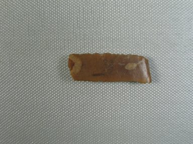  <em>Rectangular Flint</em>, ca. 1352-1336 B.C.E. Flint, 1 9/16 × 1/2 × 1/4 in. (4 × 1.3 × 0.7 cm). Brooklyn Museum, Gift of the Egypt Exploration Society, 25.886.19. Creative Commons-BY (Photo: , CUR.25.886.19_view01.jpg)