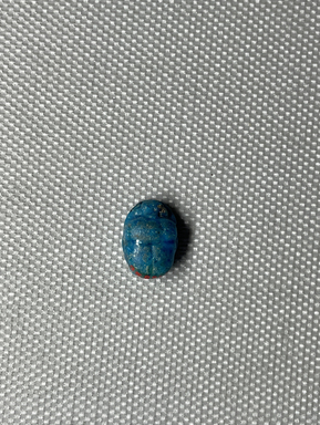  <em>Scarab</em>, ca. 1352-1336 B.C.E. Faience, 3/16 × 3/8 × 1/2 in. (0.5 × 1 × 1.3 cm). Brooklyn Museum, Gift of the Egypt Exploration Society, 25.886.4. Creative Commons-BY (Photo: Brooklyn Museum, CUR.25.886.4_overall01.JPG)
