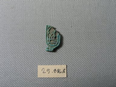  <em>Cartouche</em>, ca. 1352–1332 B.C.E. Faience, 7/8 × 1/2 × 1/16 in. (2.3 × 1.2 × 0.2 cm). Brooklyn Museum, Gift of the Egypt Exploration Society, 25.886.8. Creative Commons-BY (Photo: , CUR.25.886.8_view01.jpg)