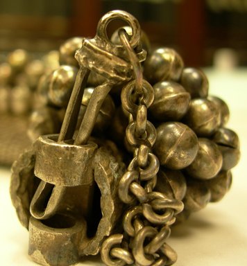  <em>Anklet, One of a Pair</em>. silver, Diam. 10 cm; Diam. with bells 11 cm. Brooklyn Museum, 25612. Creative Commons-BY (Photo: , CUR.25612_25613_detail2.jpg)
