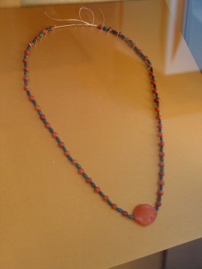  <em>Necklace</em>, ca. 1938–1759 B.C.E. Carnelian, faience, Length: 23 1/4 in. (59 cm). Brooklyn Museum, Gift of the Egypt Exploration Society
, 26.161. Creative Commons-BY (Photo: Brooklyn Museum, CUR.26.161_erg2.jpg)