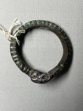 Possibly Greek. <em>Bracelet</em>, 4th-3rd century B.C.E. Bronze, silver, 2 3/8 x 2 3/8 in. (6.1 x 6.1 cm). Brooklyn Museum, Gift of George D. Pratt, 26.762. Creative Commons-BY (Photo: Brooklyn Museum, CUR.26.762_overall01.JPG)