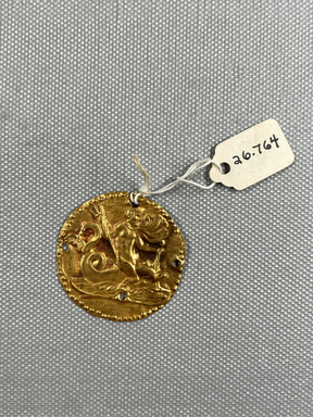 Roman. <em>Disk</em>, 3rd century C.E. Gold, 1 7/16 in. (3.7 cm). Brooklyn Museum, Gift of George D. Pratt, 26.764. Creative Commons-BY (Photo: Brooklyn Museum, CUR.26.764_overall.JPG)