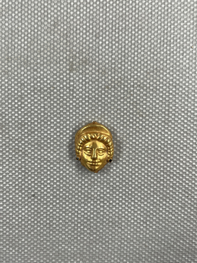 Roman ?. <em>Ornament</em>, 2nd century C.E., or later. Gold, Length: 5/8 in. (1.6 cm). Brooklyn Museum, Gift of George D. Pratt, 26.769. Creative Commons-BY (Photo: Brooklyn Museum, CUR.26.769_overall.JPG)