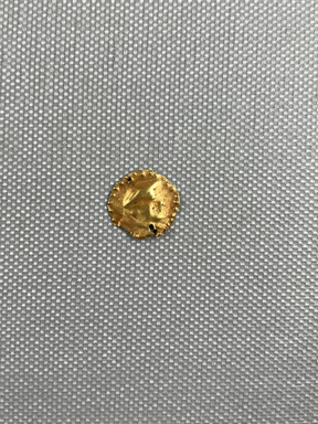 Roman ?. <em>Small Thin Disk</em>, 3rd century C.E. Gold, 5/8 in. (1.6 cm). Brooklyn Museum, Gift of George D. Pratt, 26.773. Creative Commons-BY (Photo: Brooklyn Museum, CUR.26.773_overall.JPG)