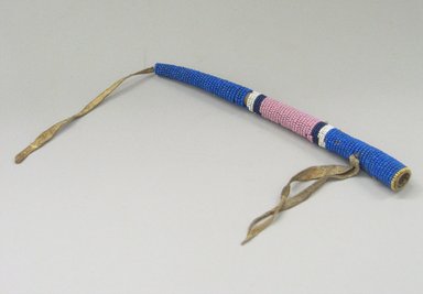 Oglala, Lakota, Sioux. <em>Holder for Pointed Instrument, Part of War Outfit</em>, late 19th-early 20th century. Hide, beads, 21.3 x 1.5 cm. Brooklyn Museum, Robert B. Woodward Memorial Fund, 26.793. Creative Commons-BY (Photo: Brooklyn Museum, CUR.26.793.jpg)