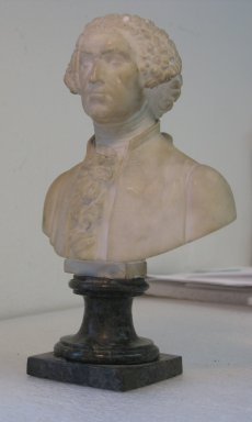 Unknown. <em>Bust of George Washington</em>. Alabaster with green stone base, 7 1/2 x 4 7/8 x 3 in. (19.1 x 12.4 x 7.6 cm). Brooklyn Museum, Gift of the Misses Marshall in memory of their mother, Martha Bradshaw Marshall, 27.408. Creative Commons-BY (Photo: Brooklyn Museum, CUR.27.408_threequarter_front_right.jpg)