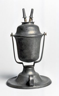 American. <em>Lamp</em>, ca. 1840. Pewter, 8 3/8 x 5 1/4 x 5 1/4 in. (21.3 x 13.3 x 13.3 cm). Brooklyn Museum, Gift of Mrs. Samuel Doughty, 27.521. Creative Commons-BY (Photo: Brooklyn Museum, CUR.27.521_view1.jpg)