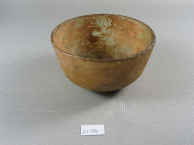 Roman. <em>Bowl</em>, 1st century B.C.E.-2nd century C.E. Glass, 2 5/8 x Diam. 4 5/8 in. (6.6 x 11.7 cm). Brooklyn Museum, Anonymous gift, 27.727. Creative Commons-BY (Photo: Brooklyn Museum, CUR.27.727_view2.jpg)