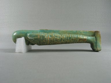  <em>Ushabti</em>, 664-332 B.C.E. Faience, 6 13/16 x 2 x 1 1/2 in. (17.3 x 5.1 x 3.8 cm). Brooklyn Museum, Gift of the Long Island Historical Society, 28.524. Creative Commons-BY (Photo: Brooklyn Museum, CUR.28.524_view5.jpg)