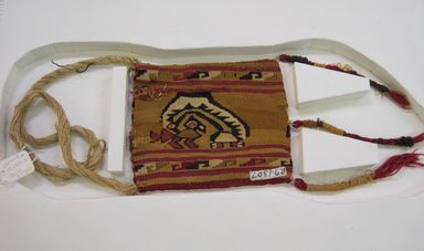 Chancay. <em>Bag, Fragment or Textile Fragment, undetermined</em>, 1000-1532. Cotton, camelid fiber, 9 1/2 × 4 5/16 in. (24.1 × 11 cm), not including handle. Brooklyn Museum, Museum Collection Fund, 29.1312.6. Creative Commons-BY (Photo: , CUR.29.1312.6_view01.jpg)