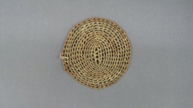  <em>Basketry Lid</em>, early 20th century. Reed, grass, 4 13/16 in. (12.2 cm). Brooklyn Museum, Gift of Lucy Addoms, 30.1231. Creative Commons-BY (Photo: Brooklyn Museum, CUR.30.1231.jpg)
