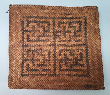Pishanko. <em>Small Square Cassava Mat</em>, early 20th century. Plant fiber, 11 5/8 × 1/8 × 12 5/8 in. (29.5 × 0.3 × 32.1 cm). Brooklyn Museum, Museum Expedition 1930, Robert B. Woodward Memorial Fund and the Museum Collection Fund, 30.1296. Creative Commons-BY (Photo: Brooklyn Museum, CUR.30.1296.jpg)