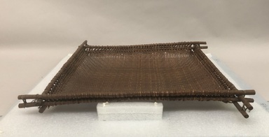 Arekuna. <em>Cassava Tray</em>, early 20th century. Plant fiber, wood, 2 1/2 × 16 × 14 5/8 in. (6.4 × 40.6 × 37.1 cm). Brooklyn Museum, Museum Expedition 1930, Robert B. Woodward Memorial Fund and the Museum Collection Fund, 30.1298. Creative Commons-BY (Photo: Brooklyn Museum, CUR.30.1298_view01.jpg)