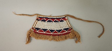 Arekuna. <em>Child's Apron</em>, early 20th century. Blue, white and red beads, 3 1/16 × 4 3/4 × 1/4 in. (7.8 × 12.1 × 0.6 cm). Brooklyn Museum, Museum Expedition 1930, Robert B. Woodward Memorial Fund and the Museum Collection Fund, 30.1302d. Creative Commons-BY (Photo: Brooklyn Museum, CUR.30.1302D.jpg)