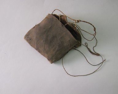 Arekuna. <em>Small Bag with Witch Doctor's Charms</em>, early 20th century. Otter skin, string, 3 11/16 × 3 3/4 × 1 7/16 in. (9.4 × 9.5 × 3.7 cm). Brooklyn Museum, Museum Expedition 1930, Robert B. Woodward Memorial Fund and the Museum Collection Fund, 30.1302e. Creative Commons-BY (Photo: Brooklyn Museum, CUR.30.1302e_view1.jpg)