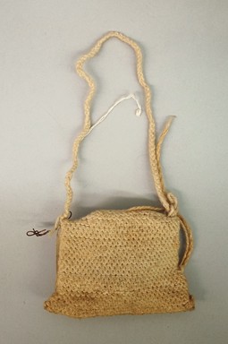 Arekuna. <em>Bag Containing Crystal</em>, early 20th century. Cotton, crystal, 7 1/4 × 4 × 1 in. (18.4 × 10.2 × 2.5 cm), includes handle. Brooklyn Museum, Museum Expedition 1930, Robert B. Woodward Memorial Fund and the Museum Collection Fund, 30.1304. Creative Commons-BY (Photo: Brooklyn Museum, CUR.30.1304_view01.jpg)