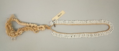 Arekuna. <em>Necklace</em>, early 20th century. Cotton, glass beads, 2 1/4 × 1 × 17 3/4 in. (5.7 × 2.5 × 45.1 cm). Brooklyn Museum, Museum Expedition 1930, Robert B. Woodward Memorial Fund and the Museum Collection Fund, 30.1330. Creative Commons-BY (Photo: Brooklyn Museum, CUR.30.1330.jpg)