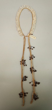 Pishanko Tribe. <em>Necklace</em>, early 20th century. Cotton, glass beads, metal cylinders, 4 9/16 × 1/4 × 20 1/2 in. (11.6 × 0.6 × 52.1 cm). Brooklyn Museum, Museum Expedition 1930, Robert B. Woodward Memorial Fund and the Museum Collection Fund, 30.1332. Creative Commons-BY (Photo: Brooklyn Museum, CUR.30.1332.jpg)