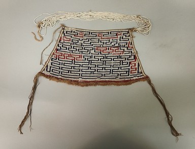 Makushi-Monaiko. <em>Apron</em>, early 20th century. Glass beads, cotton, A: 7 3/8 × 14 3/4 × 1/4 in. (18.7 × 37.5 × 0.6 cm). Brooklyn Museum, Museum Expedition 1930, Robert B. Woodward Memorial Fund and the Museum Collection Fund, 30.1360. Creative Commons-BY (Photo: Brooklyn Museum, CUR.30.1360.jpg)