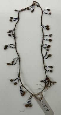 Pishanko. <em>Necklace</em>, early 20th century. Cotton, glass beads, 2 3/4 × 1/8 × 8 1/2 in. (7 × 0.3 × 21.6 cm). Brooklyn Museum, Museum Expedition 1930, Robert B. Woodward Memorial Fund and the Museum Collection Fund, 30.1379. Creative Commons-BY (Photo: Brooklyn Museum, CUR.30.1379_overall.jpg)