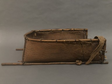 Arekuna. <em>Carrying Basket</em>, early 20th century. Plant fiber, wood, 28 1/2 × 13 × 7 1/2 in. (72.4 × 33 × 19.1 cm). Brooklyn Museum, Museum Expedition 1930, Robert B. Woodward Memorial Fund and the Museum Collection Fund, 30.1382. Creative Commons-BY (Photo: Brooklyn Museum, CUR.30.1382_view01.jpg)