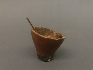 Arekuna. <em>Gourd Bowl Filled with Black Pigment</em>, early 20th century. Gourd, resin, wood, 2 1/4 × 2 1/4 × 1 7/8 in. (5.7 × 5.7 × 4.8 cm), including stick. Brooklyn Museum, Museum Expedition 1930, Robert B. Woodward Memorial Fund and the Museum Collection Fund, 30.1418. Creative Commons-BY (Photo: Brooklyn Museum, CUR.30.1418_view01.jpg)