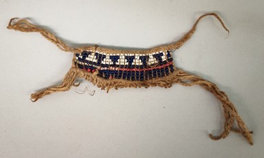 Arekuna. <em>Child's Apron</em>, early 20th century. Glass beads, cotton, 1 1/16 × 3 1/2 × 1/4 in. (2.7 × 8.9 × 0.6 cm), not including tassels. Brooklyn Museum, Museum Expedition 1930, Robert B. Woodward Memorial Fund and the Museum Collection Fund, 30.1427. Creative Commons-BY (Photo: Brooklyn Museum, CUR.30.1427.jpg)