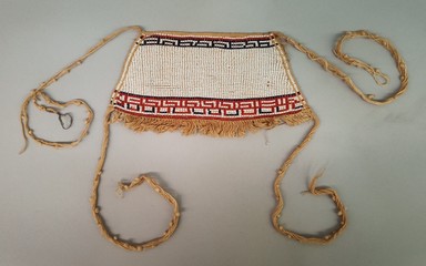 Makushi-Monaiko. <em>Woman's Apron</em>, early 20th century. Glass beads, cotton, 6 × 10 5/8 × 1/2 in. (15.2 × 27 × 1.3 cm), not including tassels. Brooklyn Museum, Museum Expedition 1930, Robert B. Woodward Memorial Fund and the Museum Collection Fund, 30.1428. Creative Commons-BY (Photo: Brooklyn Museum, CUR.30.1428.jpg)