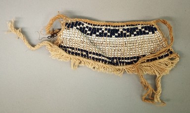 Arekuna. <em>Child's Apron</em>, early 20th century. Cotton, glass beads, Dup. #1: 5 3/8 × 7 1/2 × 1/4 in. (13.7 × 19.1 × 0.6 cm). Brooklyn Museum, Museum Expedition 1930, Robert B. Woodward Memorial Fund and the Museum Collection Fund, 30.1432. Creative Commons-BY (Photo: Brooklyn Museum, CUR.30.1432_view01.jpg)