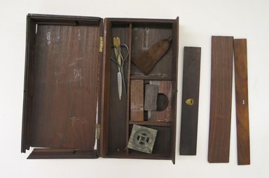  <em>Opium Kit</em>. Wood, metal, 3 x 8 3/4 x 4 7/8 in.  (7.6 x 22.2 x 12.4 cm). Brooklyn Museum, Estate of Stewart Culin, Museum Purchase, 30.297. Creative Commons-BY (Photo: Brooklyn Museum, CUR.30.297_view1.jpg)