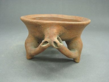  <em>Tripod Bowl</em>, 800-1500. Ceramic, orange slip, 3 x 5 3/4 x 5 1/16 in. (7.6 x 14.6 x 12.9 cm). Brooklyn Museum, Gift of Mrs. Minor C. Keith in memory of her husband, 31.1111. Creative Commons-BY (Photo: Brooklyn Museum, CUR.31.1111_view1.jpg)