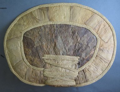 Mangbetu. <em>Woman’s Bustle (Negbe) and Front Piece (Nogimwu)</em>, early 20th century. Banana leaf,raffia, a- 10 1/8 x 13 1/2 in. (25.7 x 34.3 cm). Brooklyn Museum, Museum Expedition 1931, Robert B. Woodward Memorial Fund, 31.1832a-b. Creative Commons-BY (Photo: Brooklyn Museum, CUR.31.1832a_front.jpg)