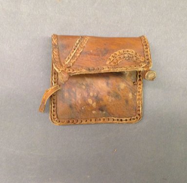 Mangbetu. <em>Small Bag for Snuff</em>, early 20th century. Leather, 2 1/2 x 2 3/4 in. (6.4 x 7 cm). Brooklyn Museum, Museum Expedition 1931, Robert B. Woodward Memorial Fund, 31.1949. Creative Commons-BY (Photo: Brooklyn Museum, CUR.31.1949.jpg)