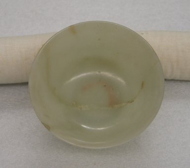  <em>Bowl</em>, 19th century. Jade, 2 3/16 x 4 1/2 in. (5.5 x 11.5 cm). Brooklyn Museum, Gift of the executors of the Estate of Colonel Michael Friedsam, 32.1307.2a. Creative Commons-BY (Photo: Brooklyn Museum, CUR.32.1307.2a_bottom.jpg)