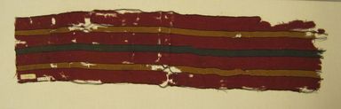Nasca. <em>Mantle, Fragment or Mantle, Band from Rear Edge, Fragment</em>, 200-600. Camelid fiber, 6 1/2 × 28 1/4 in. (16.5 × 71.8 cm). Brooklyn Museum, Gift of George D. Pratt, 32.1455. Creative Commons-BY (Photo: Brooklyn Museum, CUR.32.1455_view01.jpg)