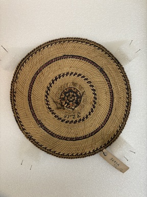 Coast Salish. <em>Round Mat</em>, early 20th century. Squaw grass, (18.5 cm diam.). Brooklyn Museum, Gift of Nina L. Franklin, 32.16. Creative Commons-BY (Photo: Brooklyn Museum, CUR.32.16.JPEG)