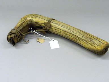 Blackfoot. <em>Dressing Tool</em>, 19th century. Elk horn, leather, metal, 10 1/4 x 4 5/16in. (26 x 11cm). Brooklyn Museum, Bequest of W.S. Morton Mead, 32.2099.32559. Creative Commons-BY (Photo: Brooklyn Museum, CUR.32.2099.32559_view1.jpg)