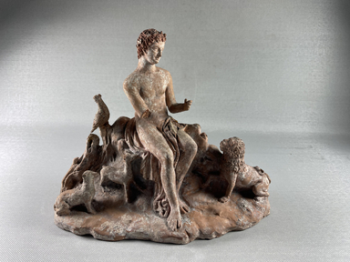  <em>Orpheus Playing the Lyre, Surrounded by Animals</em>. Clay, pigment, 6 7/8 × 2 15/16 × 9 1/4 in. (17.5 × 7.5 × 23.5 cm). Brooklyn Museum, Gift of Theodora Wilbour, 32.525.105. Creative Commons-BY (Photo: Brooklyn Museum, CUR.32.525.105_view01.jpg)