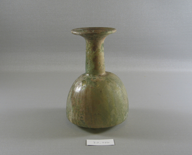 Roman. <em>Bottle</em>, late 3rd-4th century C.E. Glass, 6 1/2 x Diam. 4 1/2 in. (16.5 x 11.4 cm). Brooklyn Museum, Gift of the executors of the Estate of Colonel Michael Friedsam, 32.746. Creative Commons-BY (Photo: Brooklyn Museum, CUR.32.746_view1.jpg)