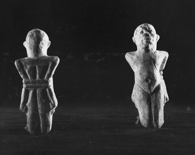  <em>Small Figurine of a Bound Captive</em>, 664-525 B.C.E. Limestone, 2 3/16 × 7/8 × 11/16 in. (5.6 × 2.3 × 1.7 cm). Brooklyn Museum, Charles Edwin Wilbour Fund, 33.313. Creative Commons-BY (Photo: Brooklyn Museum, CUR.33.313_NegB_print_bw.jpg)