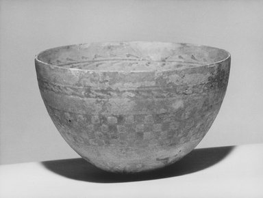  <em>Molded Hemispherical Bowl</em>, 2nd–1st century B.C.E. Faience, 3 9/16 x Diam. 5 7/8 in. (9 x 15 cm). Brooklyn Museum, Charles Edwin Wilbour Fund, 33.581. Creative Commons-BY (Photo: Brooklyn Museum, CUR.33.581_NegID_L335_24_print_bw.jpg)