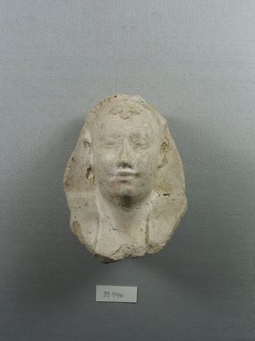  <em>Model of a Head of a King</em>, ca. 664-525 B.C.E. Plaster, 3 15/16 x 3 5/16 in. (10 x 8.4 cm). Brooklyn Museum, Charles Edwin Wilbour Fund, 33.590. Creative Commons-BY (Photo: Brooklyn Museum, CUR.33.590_view1.jpg)