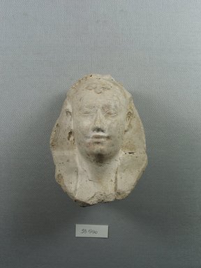  <em>Model of a Head of a King</em>, ca. 664–525 B.C.E. Plaster, 3 15/16 x 3 5/16 in. (10 x 8.4 cm). Brooklyn Museum, Charles Edwin Wilbour Fund, 33.590. Creative Commons-BY (Photo: Brooklyn Museum, CUR.33.590_view1.jpg)